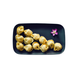 Ravioli di magro con pesto di rucola e formaggio